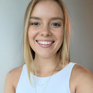 young woman with blond hair smiling