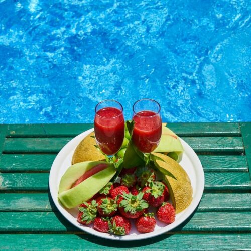 fruit and fruit juices on a tray